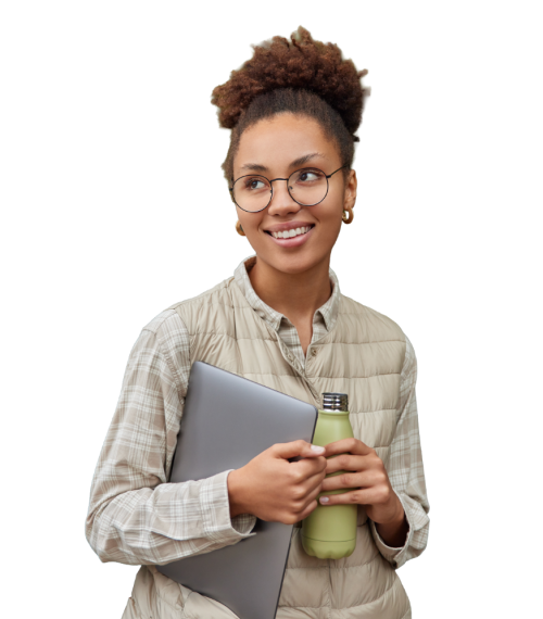 Female worker holding laptop and water bottle.